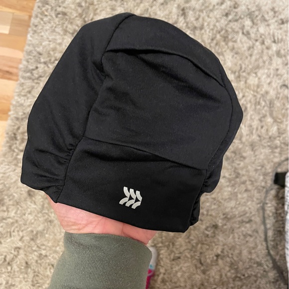 Black All in Motion Running Hat with High and Low Ponytail Openings - Picture 2 of 4